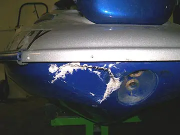 Close-up of boat hull damage