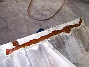 Corroded metal beam with rust